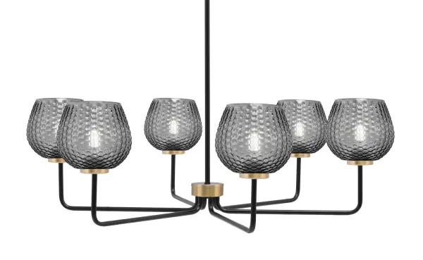 The Sandia 6-Light Chandelier combines matte black and new age brass finishes for a sophisticated industrial aesthetic. Smoke textured glass shades create ambient lighting perfect for large dining spaces and kitchen islands.