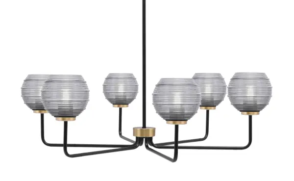 The Sandia 6-Light Chandelier combines matte black and new age brass finishes for a sophisticated modern aesthetic. Smoke ribbed glass shades create captivating light effects while diffusing a warm glow across your space.