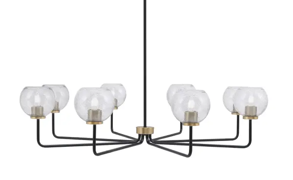 The Sandia 8-Light Chandelier combines industrial charm with modern luxury through its striking two-tone finish and unique smoke bubble glass shades. At 43.5 inches wide, it makes a commanding statement over large dining tables and kitchen islands.