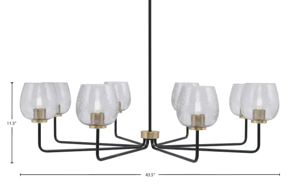 The Sandia 8-Light Chandelier makes a striking statement with its generous 43.5-inch span and distinctive smoke bubble glass shades. The mixed-metal finish of matte black and new age brass creates visual depth while the textured glass diffuses light beautifully. - alternate view