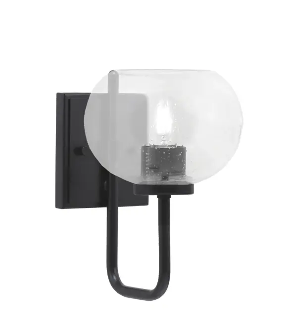 The Sandia Wall Sconce combines sleek matte black metalwork with distinctive clear bubble glass for a sophisticated industrial aesthetic. Versatile up or down mounting and dimmable capability make it adaptable to various spaces.