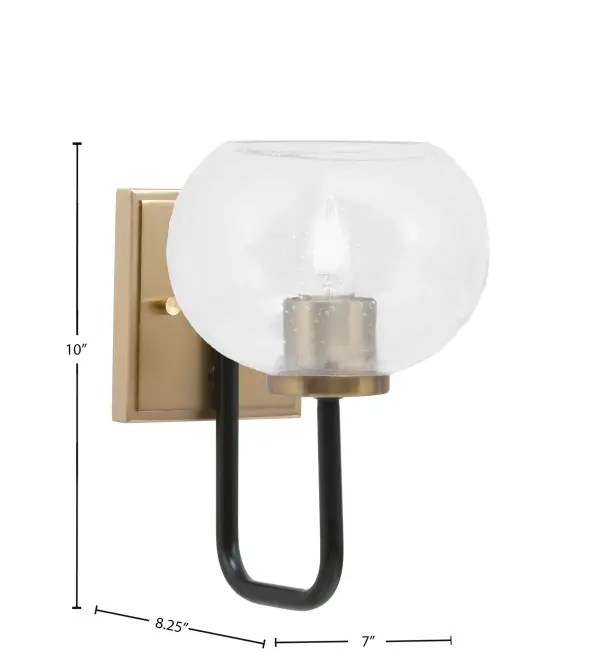 The Sandia Wall Sconce combines matte black and brass finishes for a sophisticated modern look. Its 7-inch clear bubble glass shade adds texture and visual interest while diffusing warm light. Compact size and flexible mounting make it versatile. - alternate view