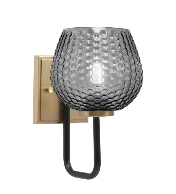 The Sandia Wall Sconce blends sleek modern design with vintage details through its striking Matte Black and New Age Brass finish. The 6-inch smoke textured glass shade creates warm, ambient lighting perfect for intimate spaces.
