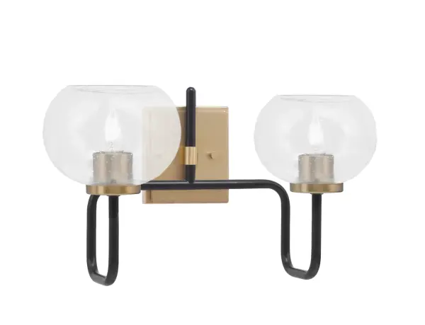 The Sandia 2-Light Bath Bar combines matte black and warm brass finishes for a striking contemporary look. Clear bubble glass shades create soft, diffused lighting perfect for vanity applications in modern and transitional bathrooms.