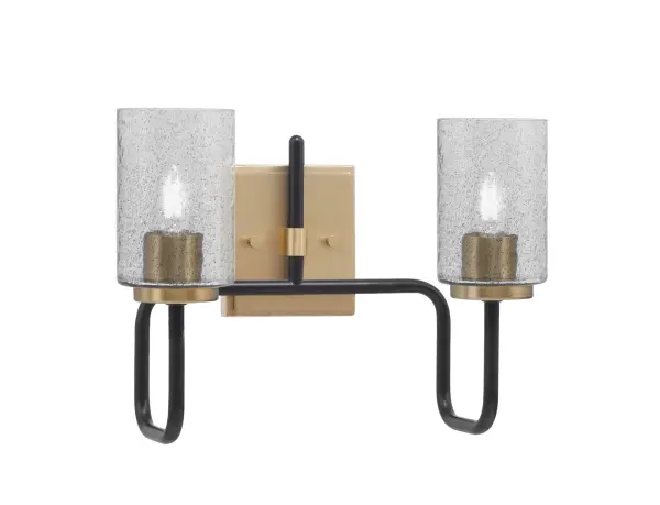 The Sandia 2-Light Bath Bar combines modern sophistication with industrial edge through its striking Matte Black and New Age Brass finish. The unique smoke bubble glass shades create visual interest while providing soft, diffused lighting.