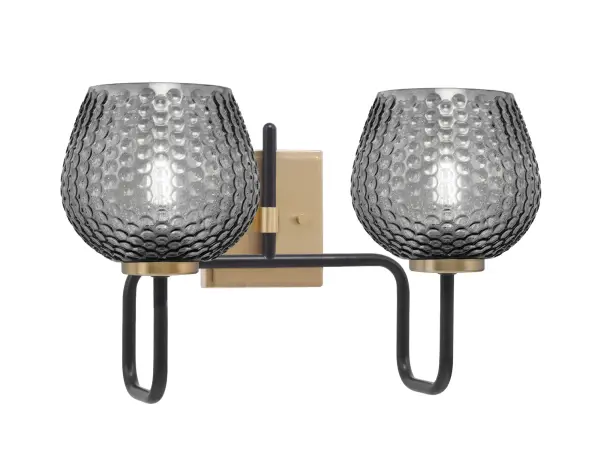 The Sandia 2-Light Bath Bar combines contemporary style with industrial edge through its striking matte black and brass finish pairing. Smoke textured glass shades diffuse light beautifully while adding visual depth.