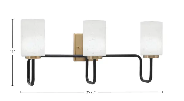 The Sandia 3-Light Bath Bar combines bold matte black with warm new age brass accents for a striking contemporary look. White muslin glass shades provide soft, flattering illumination perfect for bathroom vanities. - alternate view