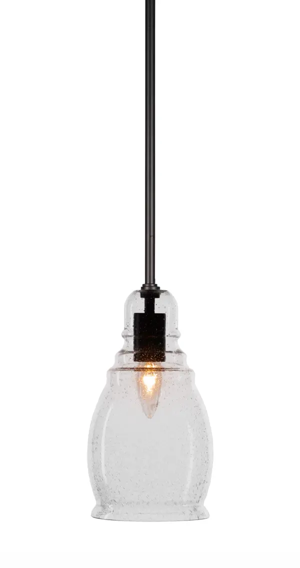 The Palisade pendant combines contemporary industrial styling with artisanal bubble glass in a compact 6-inch format. Its matte black finish and adjustable stem make it ideal for task lighting or clustered installations.