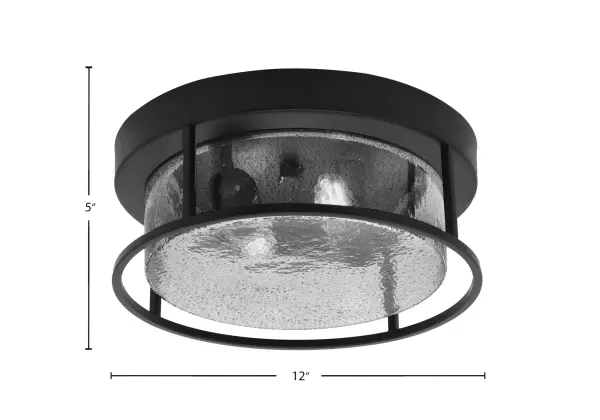 This compact 12" flush mount combines a modern matte black finish with unique smoke bubble glass for sophisticated ambient lighting. Perfect for spaces with lower ceilings or where a streamlined profile is essential. - alternate view