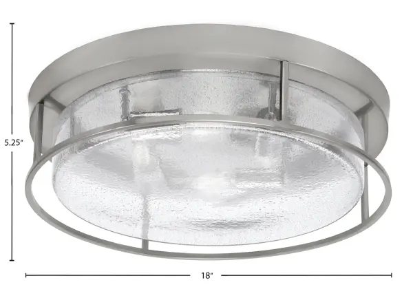 This 18-inch flush mount combines a sleek brushed nickel finish with unique smoke bubble glass, creating sophisticated ambient lighting. The 4-bulb configuration provides ample illumination while the textured glass adds visual interest. - alternate view