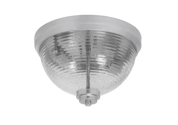 This 12" flush mount combines modern sophistication with practical design. The brushed nickel finish and smoke ribbed glass create a nuanced interplay of light and shadow, providing warm, diffused illumination perfect for low-ceiling spaces.