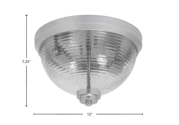 This 12" flush mount combines modern sophistication with practical design. The brushed nickel finish and smoke ribbed glass create a nuanced interplay of light and shadow, providing warm, diffused illumination perfect for low-ceiling spaces. - alternate view