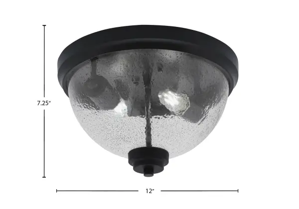 This 12-inch flush mount combines modern matte black styling with distinctive smoke bubble glass for a sophisticated look. Perfect for low-ceiling spaces, it provides warm, diffused lighting with contemporary industrial appeal. - alternate view