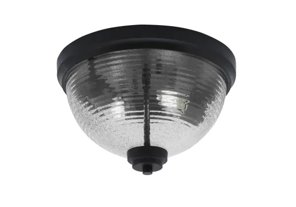 This contemporary flush mount combines matte black finish with textured smoke ribbed glass for a modern aesthetic. Perfect for spaces with lower ceilings, it provides warm diffused light while maintaining a slim 7.25" profile.