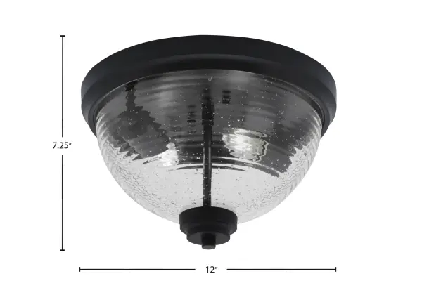 This 12-inch flush mount combines contemporary matte black finish with playful ribbed bubble glass for a unique lighting solution. Perfect for low-ceiling spaces, it provides bright diffused illumination with visual interest. - alternate view
