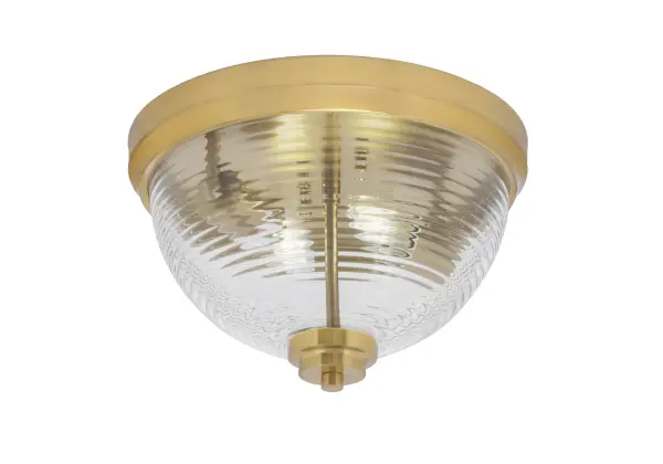 This 12" flush mount combines contemporary elegance with timeless appeal. The distinctive ribbed glass texture creates beautiful light diffusion while the New Age Brass finish adds warmth and sophistication to any space.