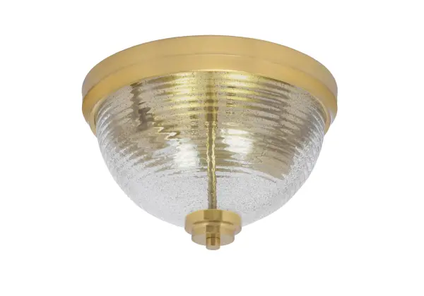 This 12" flush mount combines modern elegance with practical functionality. The New Age Brass finish and smoke ribbed glass create warm, diffused lighting perfect for intimate spaces. Compact profile ideal for low ceilings.