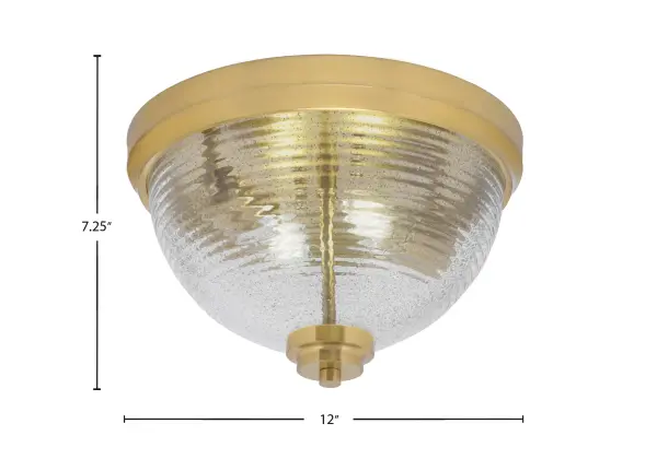 This 12" flush mount combines modern elegance with practical functionality. The New Age Brass finish and smoke ribbed glass create warm, diffused lighting perfect for intimate spaces. Compact profile ideal for low ceilings. - alternate view