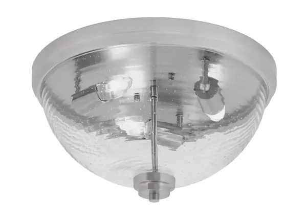 This 16-inch flush mount combines sophisticated brushed nickel with distinctive ribbed bubble glass for a refined look. Perfect for low-ceiling spaces, it provides ample illumination while adding visual interest through its textured shade.