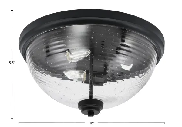 This 16-inch flush mount combines sleek matte black finish with unique ribbed bubble glass for a sophisticated contemporary look. Perfect for spaces with lower ceilings, it provides ample illumination while adding visual interest. - alternate view