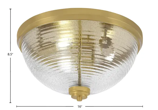 This 16" flush mount combines New Age Brass finish with distinctive smoke ribbed glass for a refined look. The low-profile design works beautifully in spaces with standard ceiling heights while providing ample illumination. - alternate view