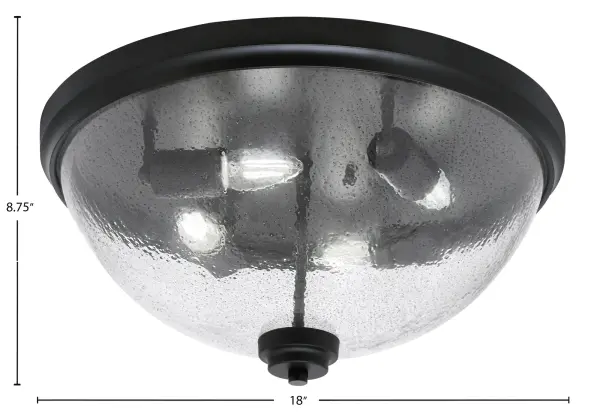 This 18-inch flush mount combines sleek matte black finish with unique smoke bubble glass for a contemporary aesthetic. With 4-bulb capacity and low-profile design, it delivers ample illumination while maintaining a modern, unobtrusive presence. - alternate view