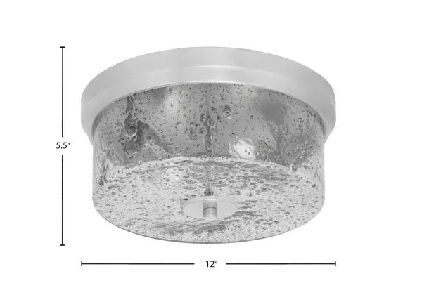 This 12-inch flush mount combines contemporary styling with practical functionality, perfect for spaces with low ceilings. The smoke bubble glass creates ambient lighting while the brushed nickel finish adds sophistication. - alternate view