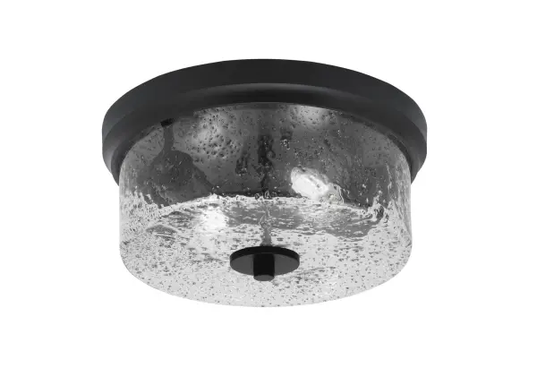 This 12-inch flush mount combines contemporary style with practical functionality. The matte black finish and unique smoke bubble glass create visual interest while the low-profile design works perfectly in spaces with standard ceiling heights.