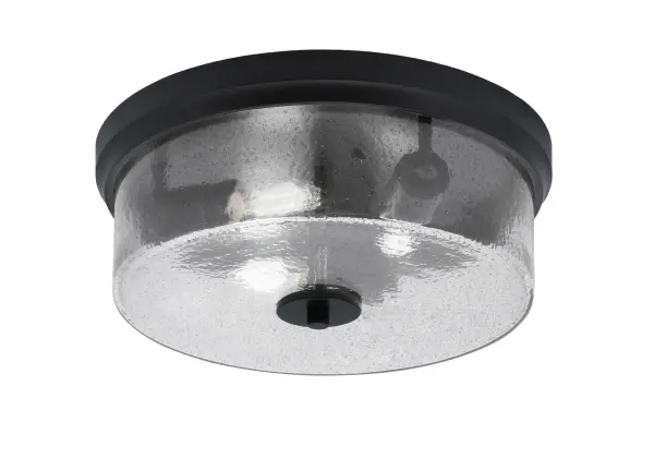 This 14" flush mount combines contemporary style with practical functionality. The unique smoke bubble glass creates sophisticated light diffusion while the matte black finish adds modern edge to any space.