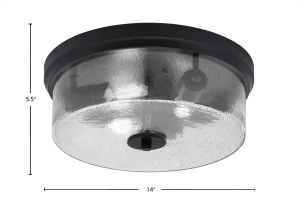 This 14" flush mount combines contemporary style with practical functionality. The unique smoke bubble glass creates sophisticated light diffusion while the matte black finish adds modern edge to any space. - alternate view