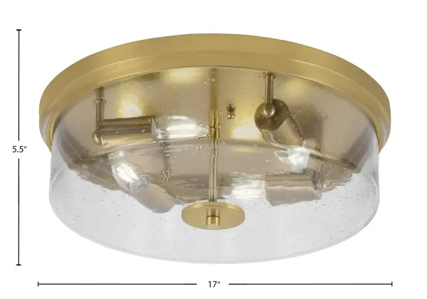 This 17-inch flush mount combines contemporary bubble glass with warm New Age Brass finish, creating an inviting ambiance. The 4-bulb design provides ample illumination while the low 5.5-inch profile works perfectly for standard ceiling heights. - alternate view