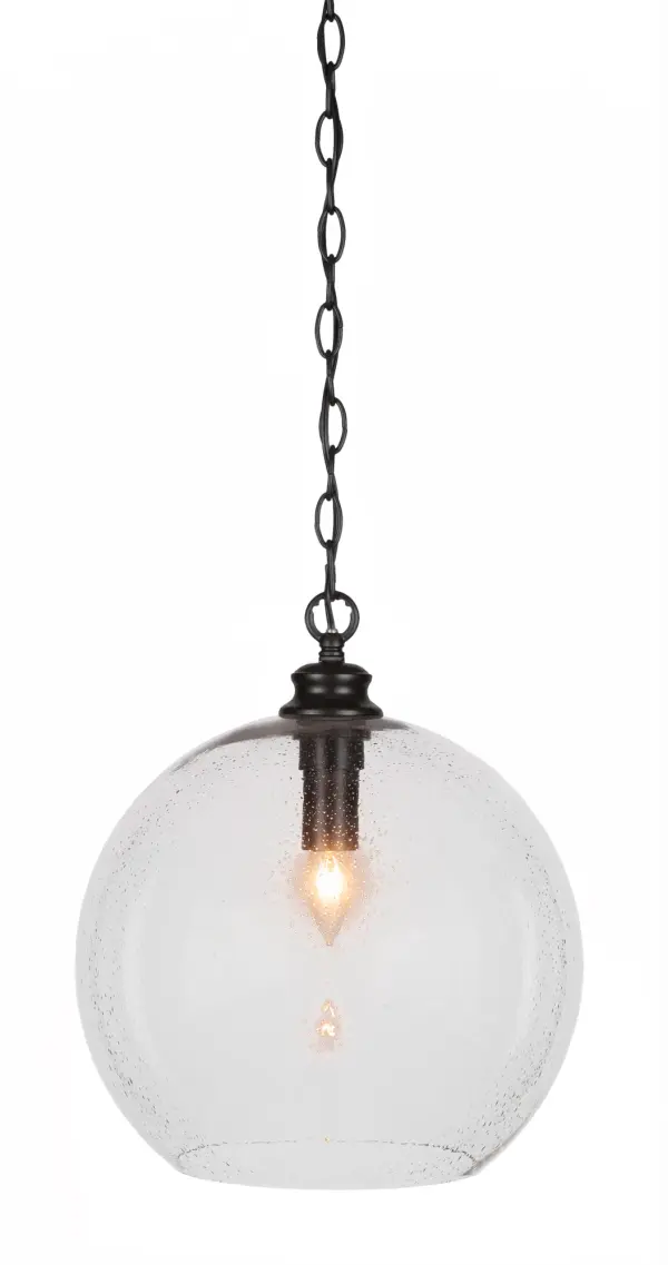 The Kimbro pendant combines sleek matte black finish with distinctive bubble glass for contemporary sophistication. Its adjustable chain and compact 13.75" diameter make it ideal for kitchen islands, dining areas, and entryways.