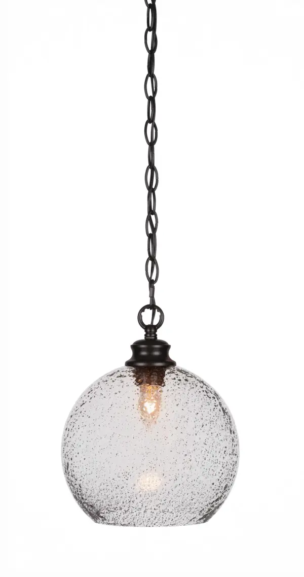 The Kimbro pendant combines industrial style with modern sophistication through its matte black finish and unique smoke bubble glass shade. Compact at 9.5" wide, it's perfect for kitchen islands or intimate dining spaces.