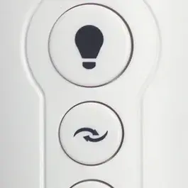 The Lucci Air Akmani remote control offers convenient wireless operation for compatible ceiling fans. Its clean off-white finish complements contemporary interiors while providing essential fan control functions.