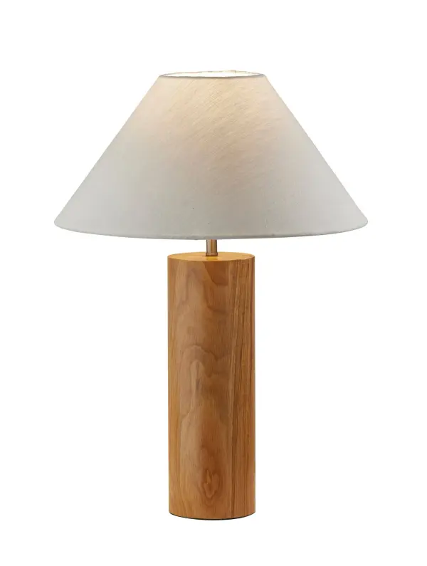 The Martin Table Lamp combines natural oak wood with antique brass accents for a sophisticated mid-century modern aesthetic. Its retro-inspired white fabric shade and quality construction make it ideal for bedrooms and living spaces.