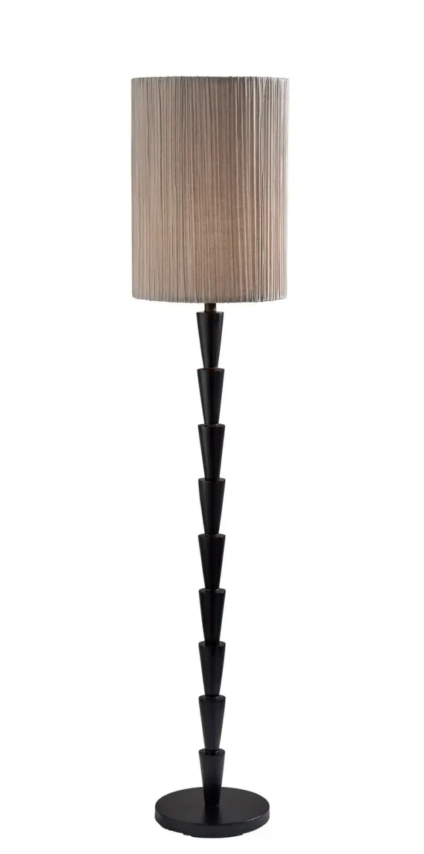 Amos Floor Lamp in Black pairs a black finish a soft pleated oatmeal linen for a warm, styled glow. Sized at H: 63", W: 13", D: 13" with a 10" Dia. base and a rotary socket switch. Uses E26 bulb base (max 100W/16W). Collection: Amos Finish: Black Glass: Soft Pleated Oatmeal Linen Width: 13.00" Height: 63.00" Length: 13.00" Weight: 17.24 lb Extension from Wall: 13.00" Wire: 60" Black Maximum Wattage: 100.00 W Bulb Base: E26 Material: POlyresin:40% Metal:20%, Fabric:30%, Electrical parts:10% Country of Origin: Cambodia Safety Listing: ETL Switch: Rotary Socket Switch