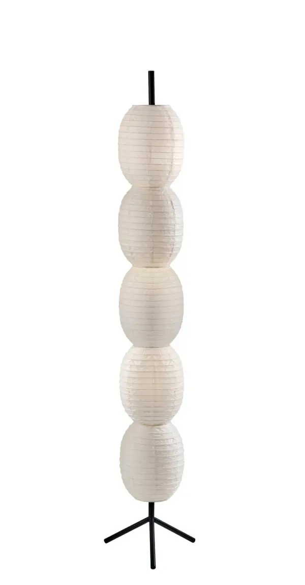 Lanai Floor Lamp in Black pairs a black finish a white paper for a warm, styled glow. Sized at H: 60", W: 12", D: 8" with a Tripod Footprint?--12" base and a foot step switch. Uses E26 bulb base (max 340W/10W). Collection: Lanai Finish: Black Glass: White Paper Width: 12.00" Height: 60.00" Length: 8.00" Weight: 7.37 lb Extension from Wall: 8.00" Wire: 60" Clear Number of Bulbs: 3 Maximum Wattage: 40.00 W Bulb Base: E26 Light Source: Incandescant Material: Metal:30%, Paper:60%, Electrical parts:20% Country of Origin: Cambodia Safety Listing: ETL Switch: Foot Step Switch