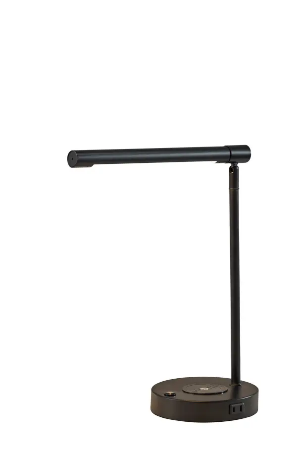 The Dax LED Desk Lamp combines sleek modern design with practical functionality, featuring adjustable height, integrated LED lighting with 3-level dimming, and a charging station base with wireless pad, AC outlet, and USB port.