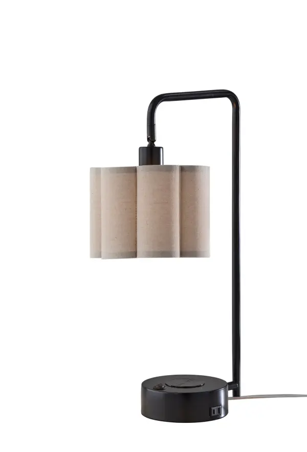 The Dover Desk Lamp combines sleek modern design with practical functionality, featuring adjustable LED lighting and a comprehensive charging base with USB-A, USB-C, AC outlet, and wireless charging capabilities.