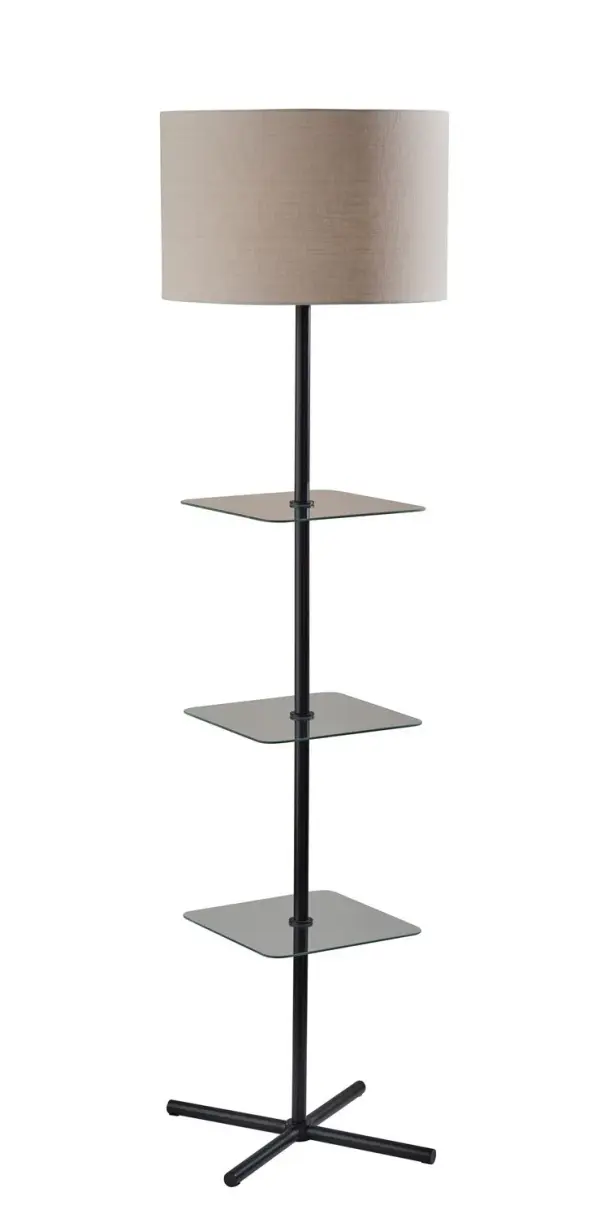 This shelf floor lamp pairs a clean-lined metal frame with three glass display shelves and a drum shade for a practical, contemporary look. The open design offers extra surface space for décor, books, or small essentials without adding visual bulk. It is an easy lighting solution for living rooms, bedrooms, and apartments. Collection: Imogen Finish: Black,Clear Glass Shelf Glass: Linen texture fabric shade Width: 18.00" Height: 67.13" Length: 18.00" Weight: 13.00 lb Extension from Wall: 18.00" Wire: 60" Clear cord Maximum Wattage: 150.00 W Bulb Base: E26 Light Source: Incandescant Material: Iron:40% Glass:30% Fabric:20% Electric:10% Country of Origin: Cambodia Safety Listing: ETL Switch: 3-way rotary switch
