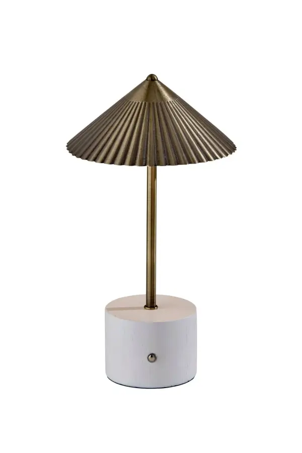 This compact accent lamp pairs a pleated metal shade with a simple round wood-look base for a fresh, sculptural mix of materials. The crisp shade profile gives it a modern point of view, while the painted base adds softness and contrast. Its small footprint makes it an easy addition to desks, shelves, and bedside tables. Collection: Mika Finish: Antique Brass Glass: Antique Brass Width: 6.50" Height: 11.75" Length: 6.50" Weight: 8.00 lb Extension from Wall: 6.50" Wire: 39" Black USB Cord Maximum Wattage: 2.00 W Bulb Base: Integrated Light Source: LED Material: Iron:50% Wood:40% Electric:10% Country of Origin: China Switch: 4-way touch switch LED