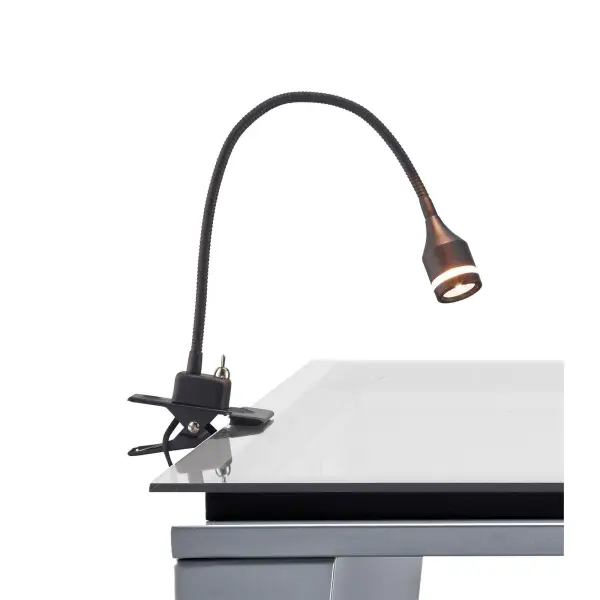 The Prospect LED Clip Lamp combines practical functionality with contemporary design. Its adjustable gooseneck arm and convex glass magnifier make it ideal for detailed work, reading, or crafting. The integrated 3W LED provides 50,000 hours of efficient lighting.