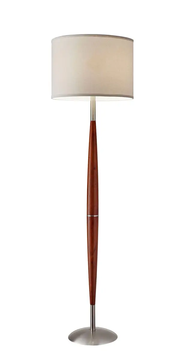 The Hudson floor lamp blends natural maple eucalyptus wood with brushed steel accents for a sophisticated contemporary look. Standing 61 inches tall with a 16-inch drum shade, it offers 3-way lighting control and smart outlet compatibility for modern convenience.
