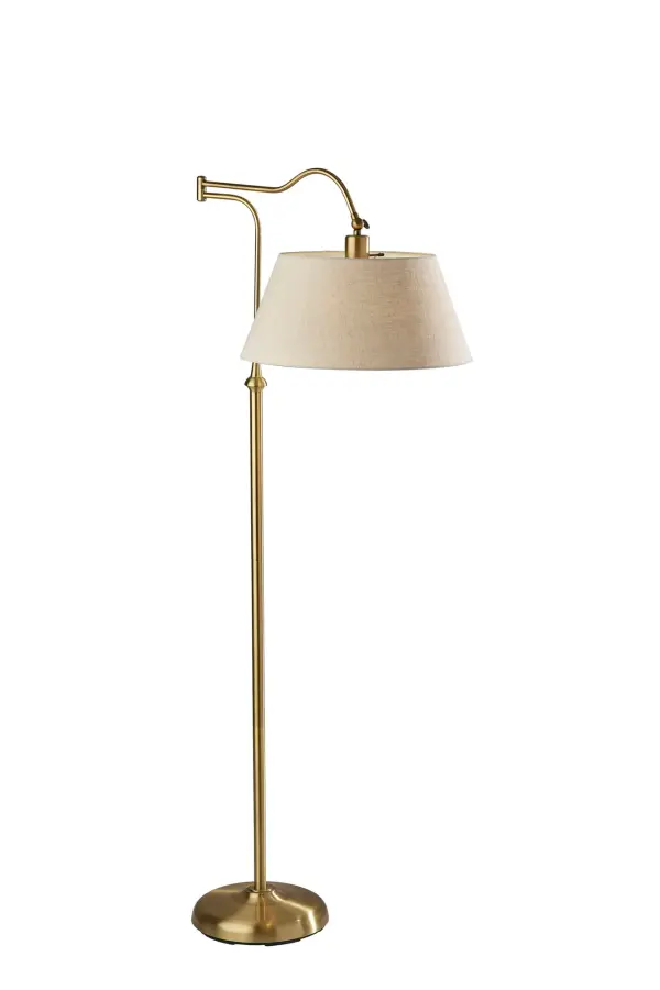 The Rodeo floor lamp modernizes the traditional bridge lamp with an adjustable swing arm and curved pole. Features a textured cream drum shade, 3-way lighting control, and antique brass finish for mid-century modern appeal.