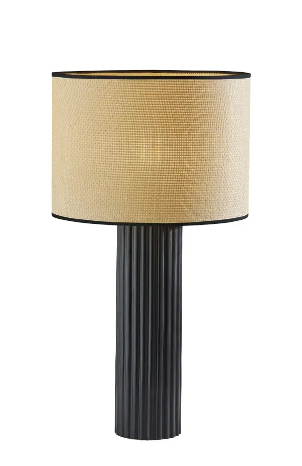 The Primrose Large Table Lamp combines natural materials with sophisticated design, featuring a ribbed black ceramic base and textured woven drum shade. At 29" tall, it provides versatile 3-way lighting perfect for entryways and living spaces.