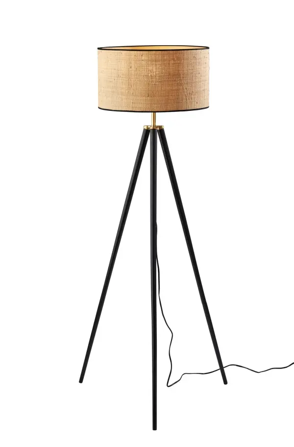 The Jackson floor lamp combines a sleek black wood tripod base with antique brass accents and a natural rattan drum shade for sophisticated style. The 3-way switch offers versatile lighting control, while the natural materials add warmth to contemporary spaces.