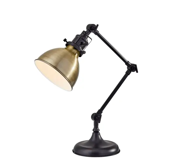 The Alden Desk Lamp combines industrial charm with practical functionality. Its three adjustable joints allow precise light direction, while the antique bronze and brass finish pairing creates visual warmth and character.