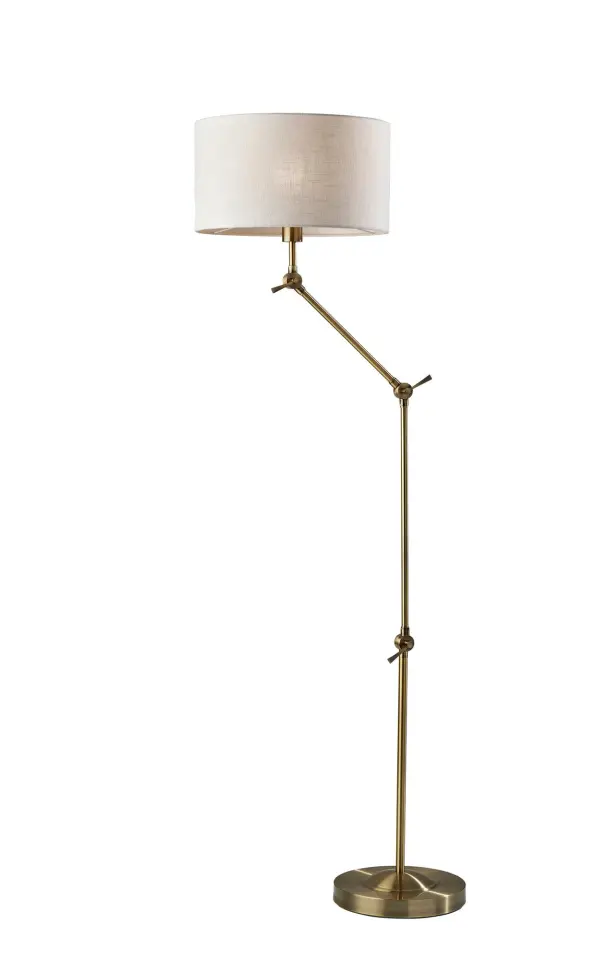 The Willard floor lamp combines mid-century modern aesthetics with exceptional functionality. Three articulation points allow customizable positioning up to 65.25" tall and 27" deep, while the antique brass finish adds warmth to any space.