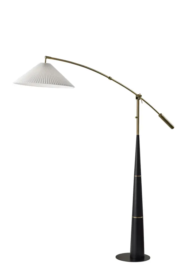 The Leroy Arc Lamp combines classic antique brass styling with modern functionality. Its adjustable height (66-87 inches) and pleated fabric shade create versatile, warm lighting perfect for reading or ambient illumination.