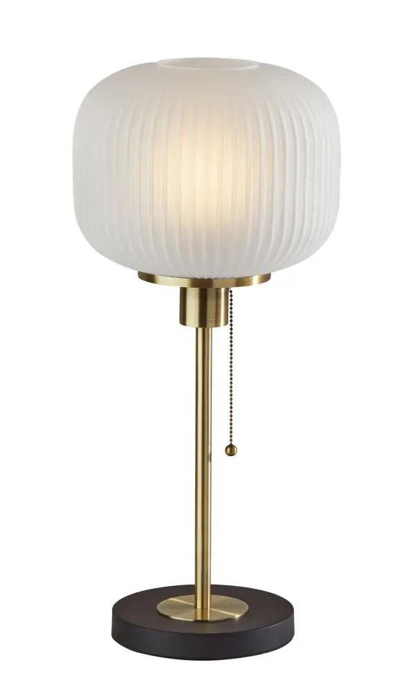The Hazel Table Lamp combines antique brass metalwork with a distinctive frosted ribbed glass shade for timeless mid-century appeal. Its compact 10-inch diameter makes it perfect for nightstands and side tables.